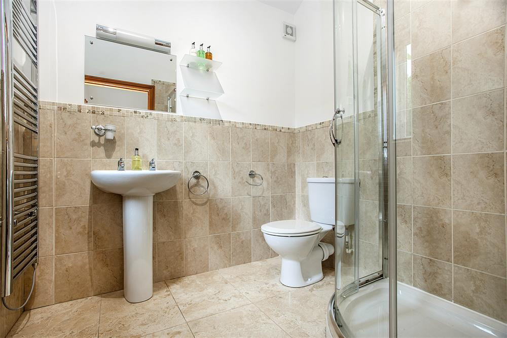 The en-suite with power shower and under floor heating