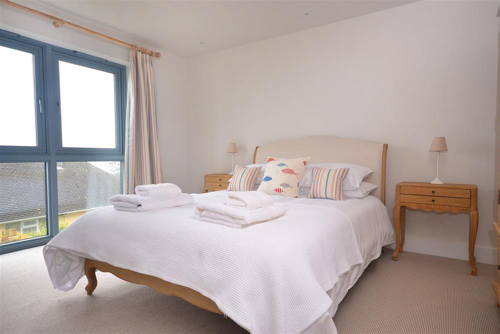 Bedroom 2 with double bed and en suite