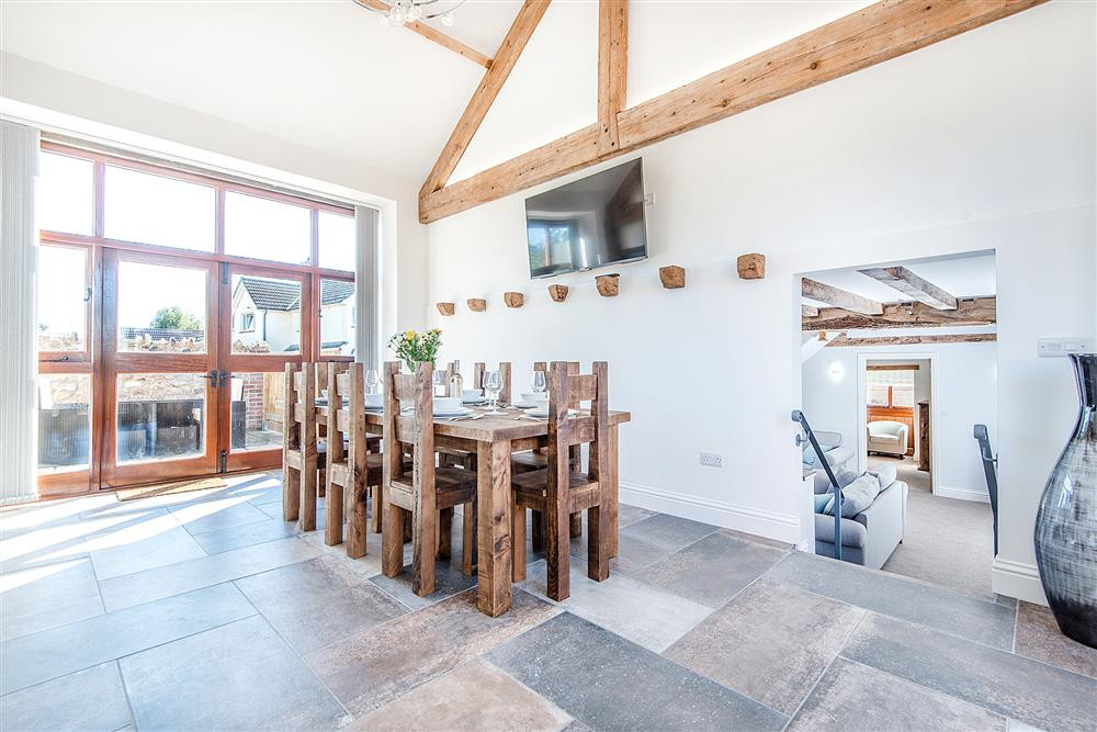 A huge kitchen diner with 55 inch Flat scrren TV