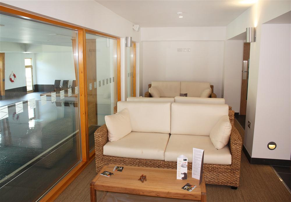 Seating in the reception area by the indoor pool