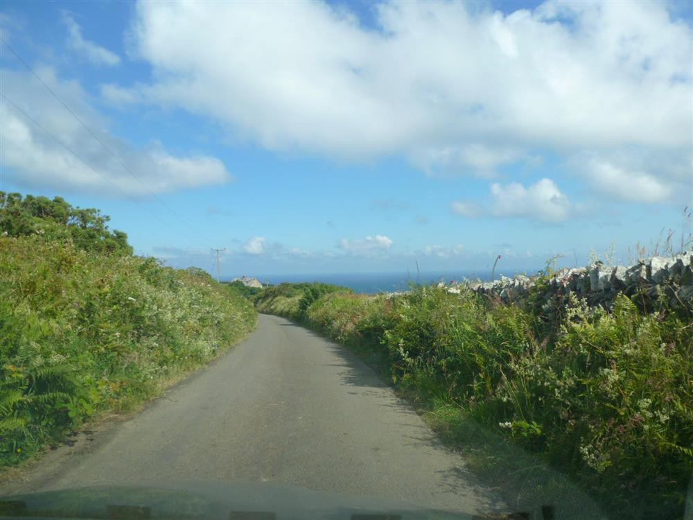 Country lane leading to Little Pol