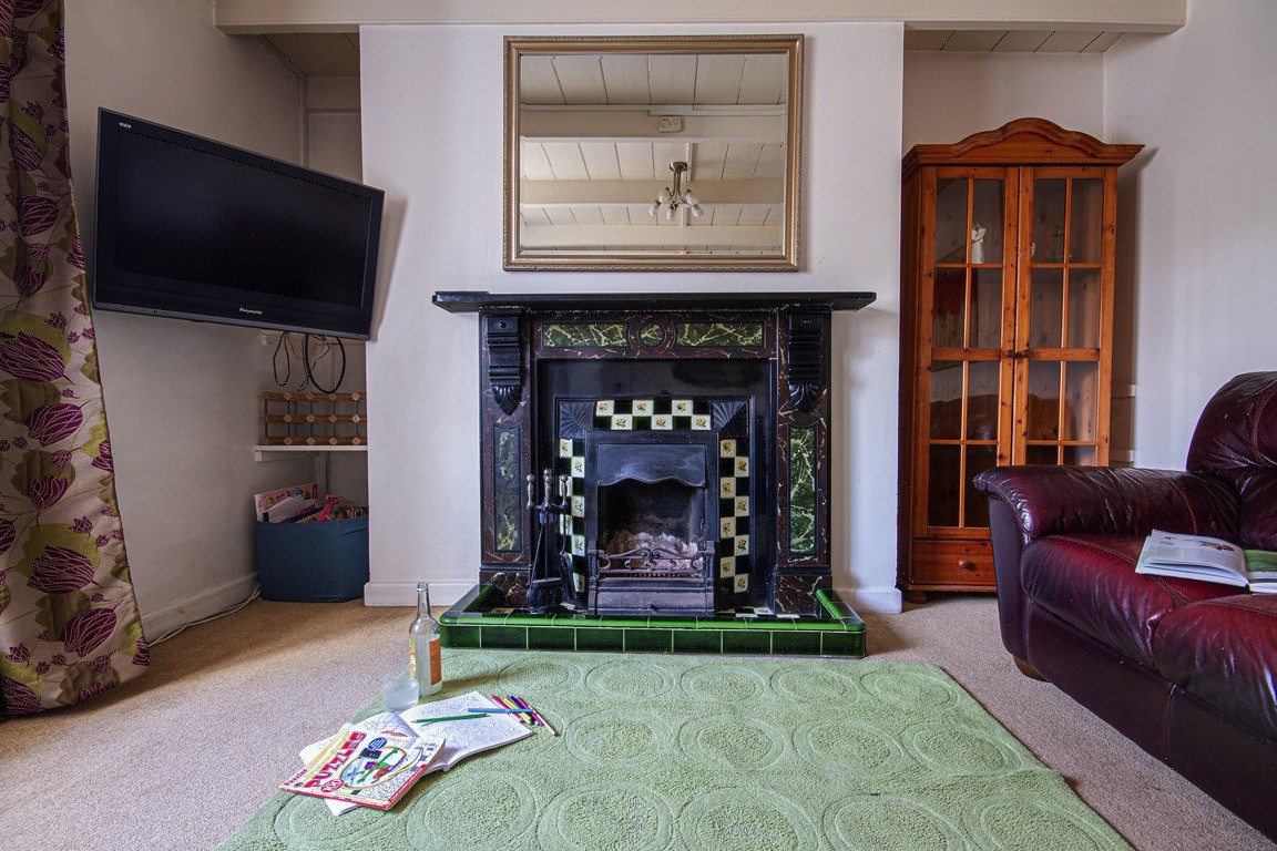Sitting room with an open fire