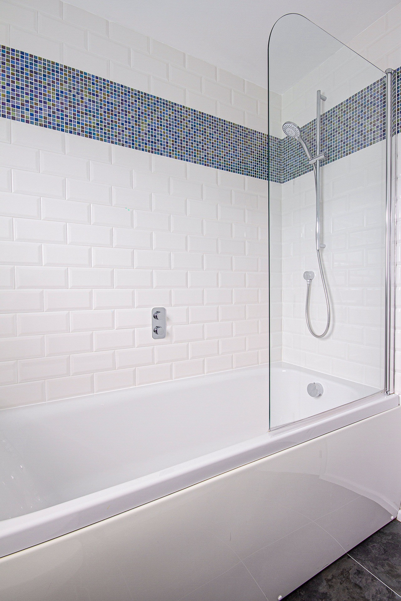 Shower over bath to ground floor