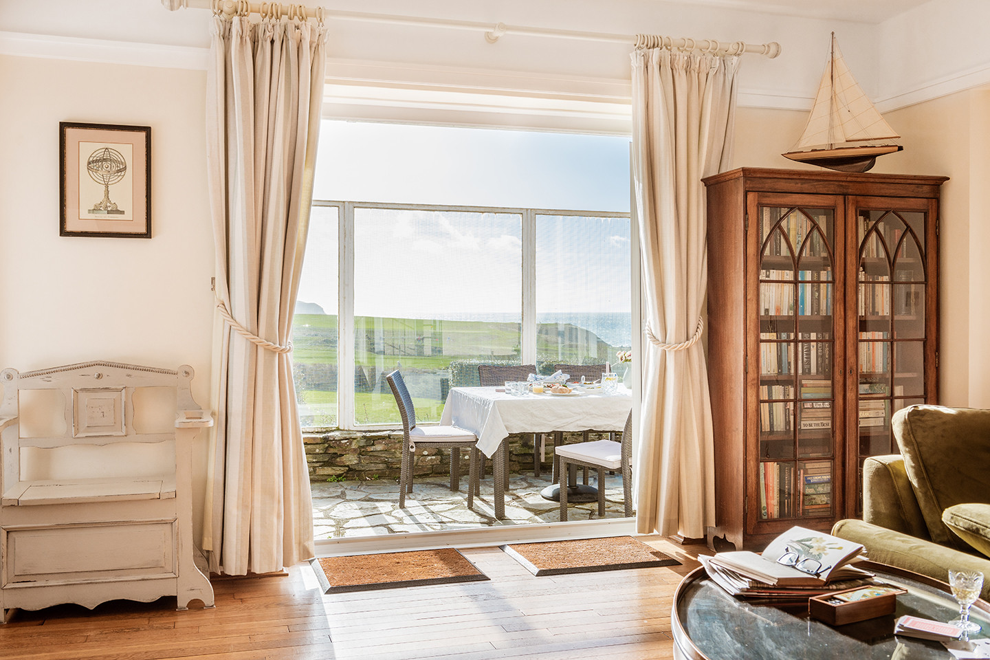Another view of the Lounge looking through the french doors onto the Patio.