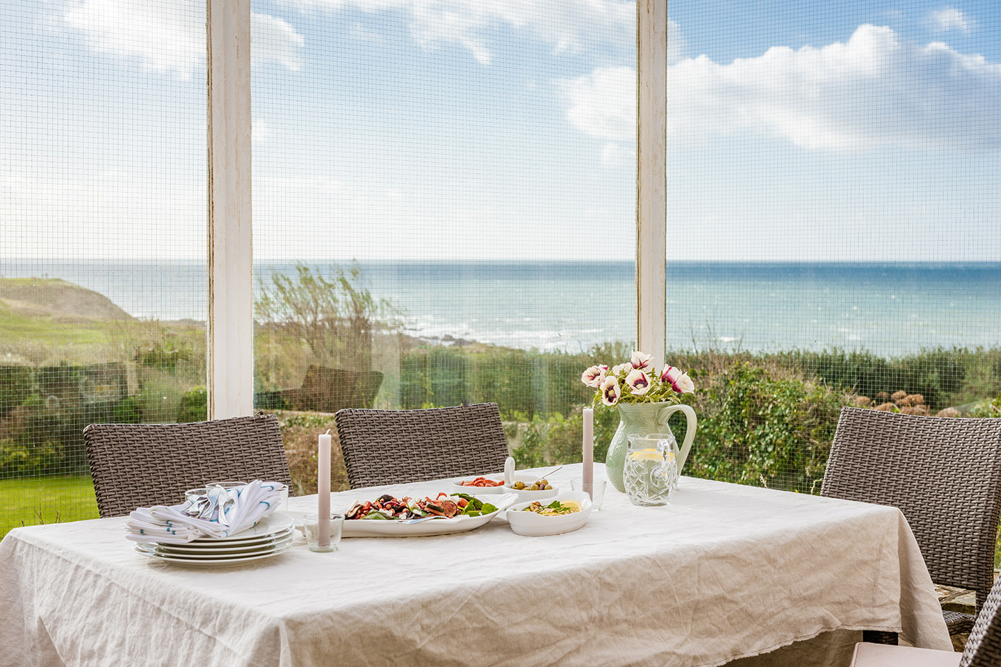 Patio dining area with stunning sea views.