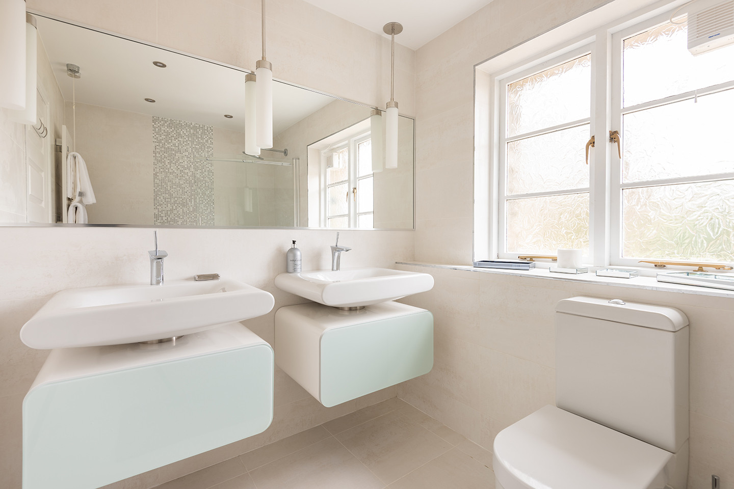 Family bathroom with twin basin.