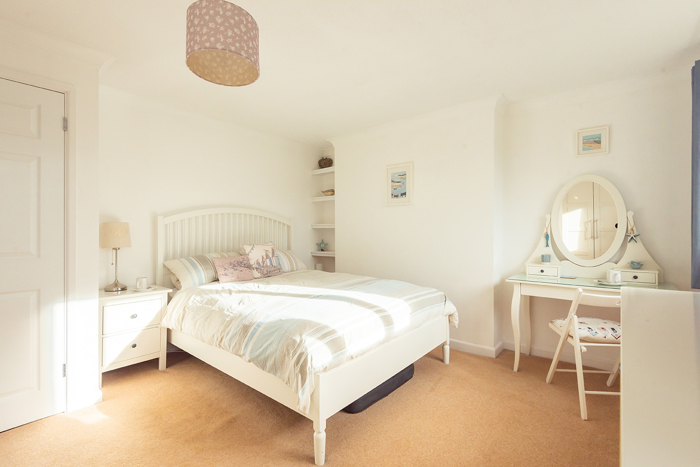 The light and airy master bedroom in this holiday home near Kingsbridge, Devon.