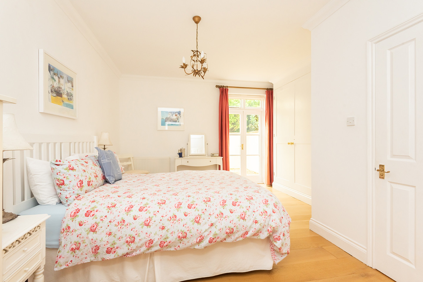 Bedroom 1 with door to the rear courtyard