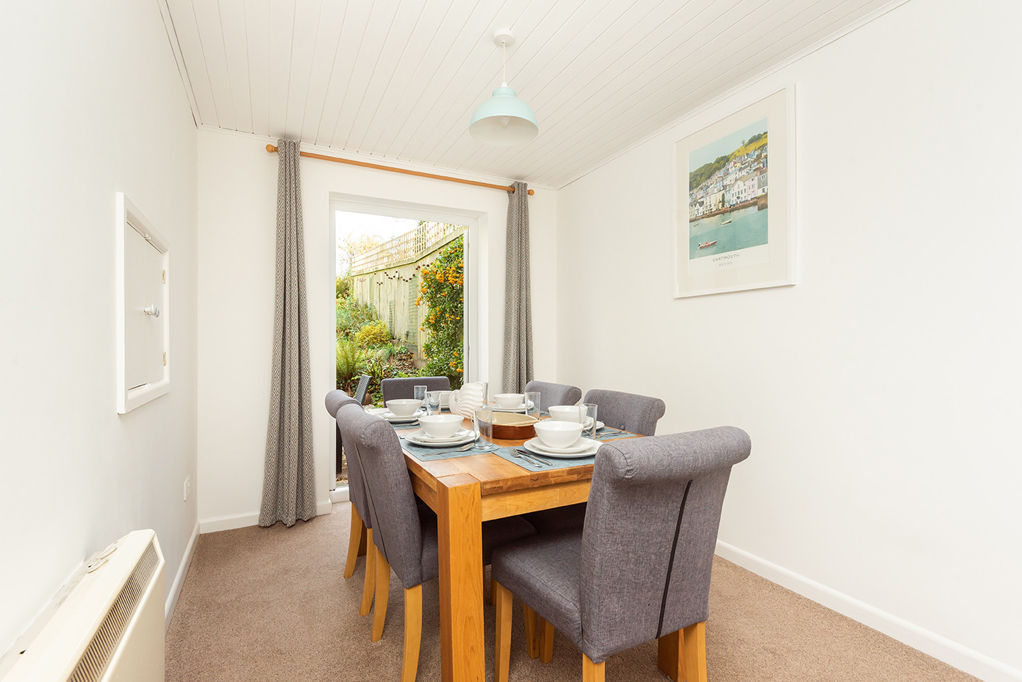The dining area opens out on to the sunny rear garden.