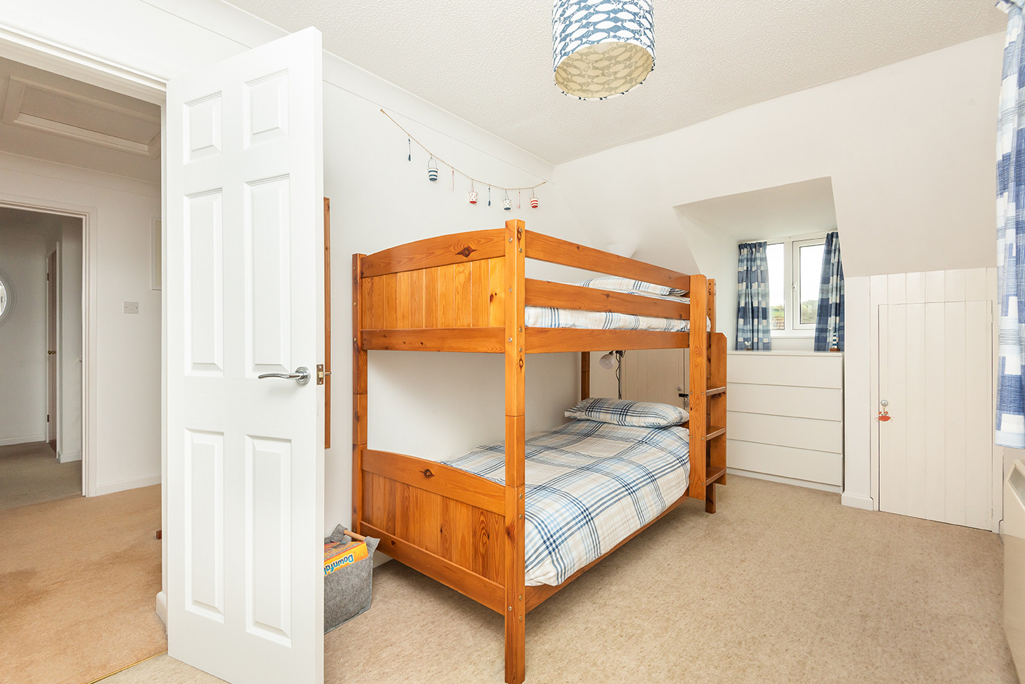 The bunk room is spacious and dual aspect