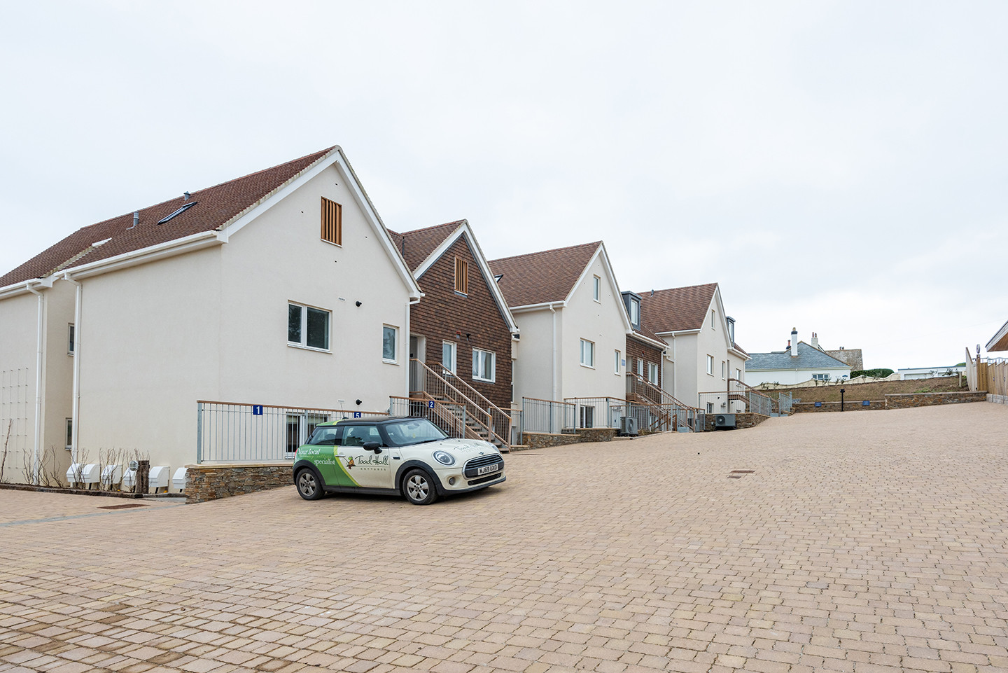 The parking are at the back of the Lanterns 