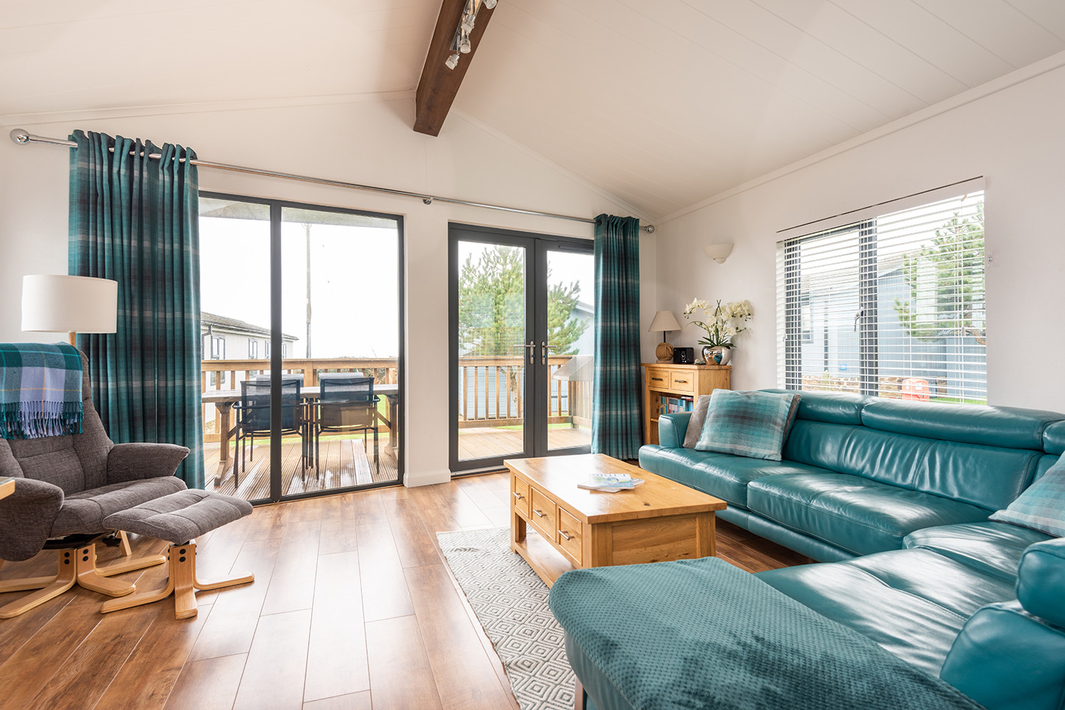 The sitting room leading out onto the decking.