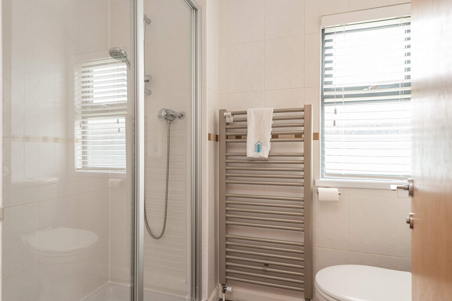 Bathroom with walk in shower.