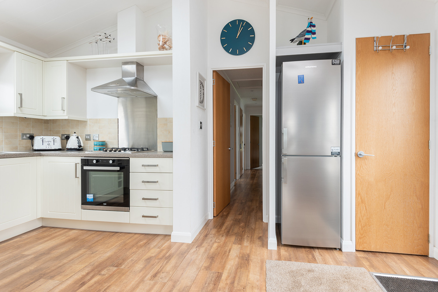 The kitchen with large fridge freezer.