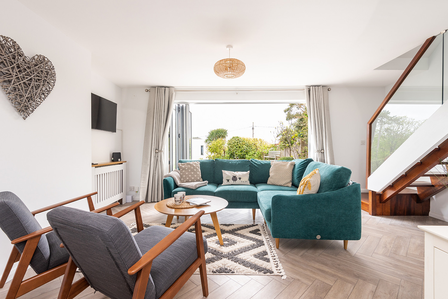 The sitting area with bifold doors.