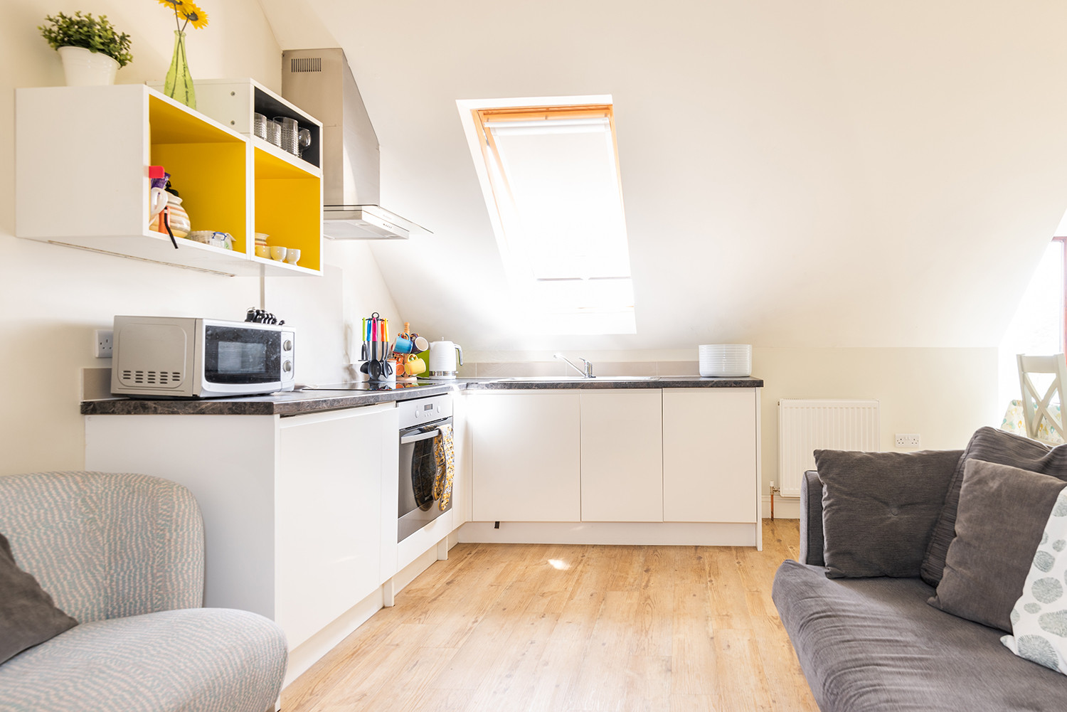 Another look at the lounge and kitchen 