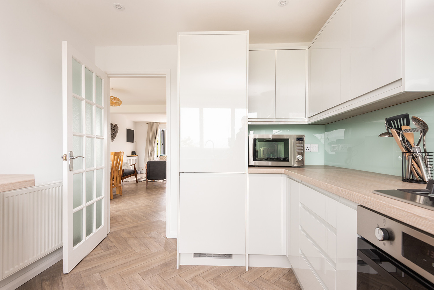 The kitchen leading to the open plan living space.