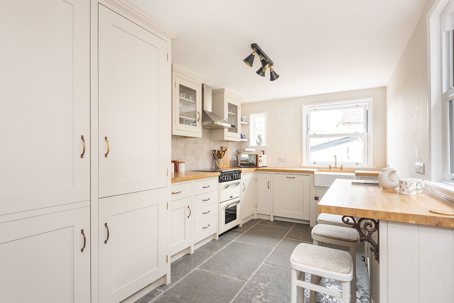 Another view of the kitchen with breakfast bar.