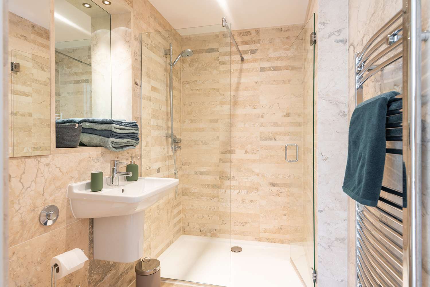 Family shower room with large walk-in shower.