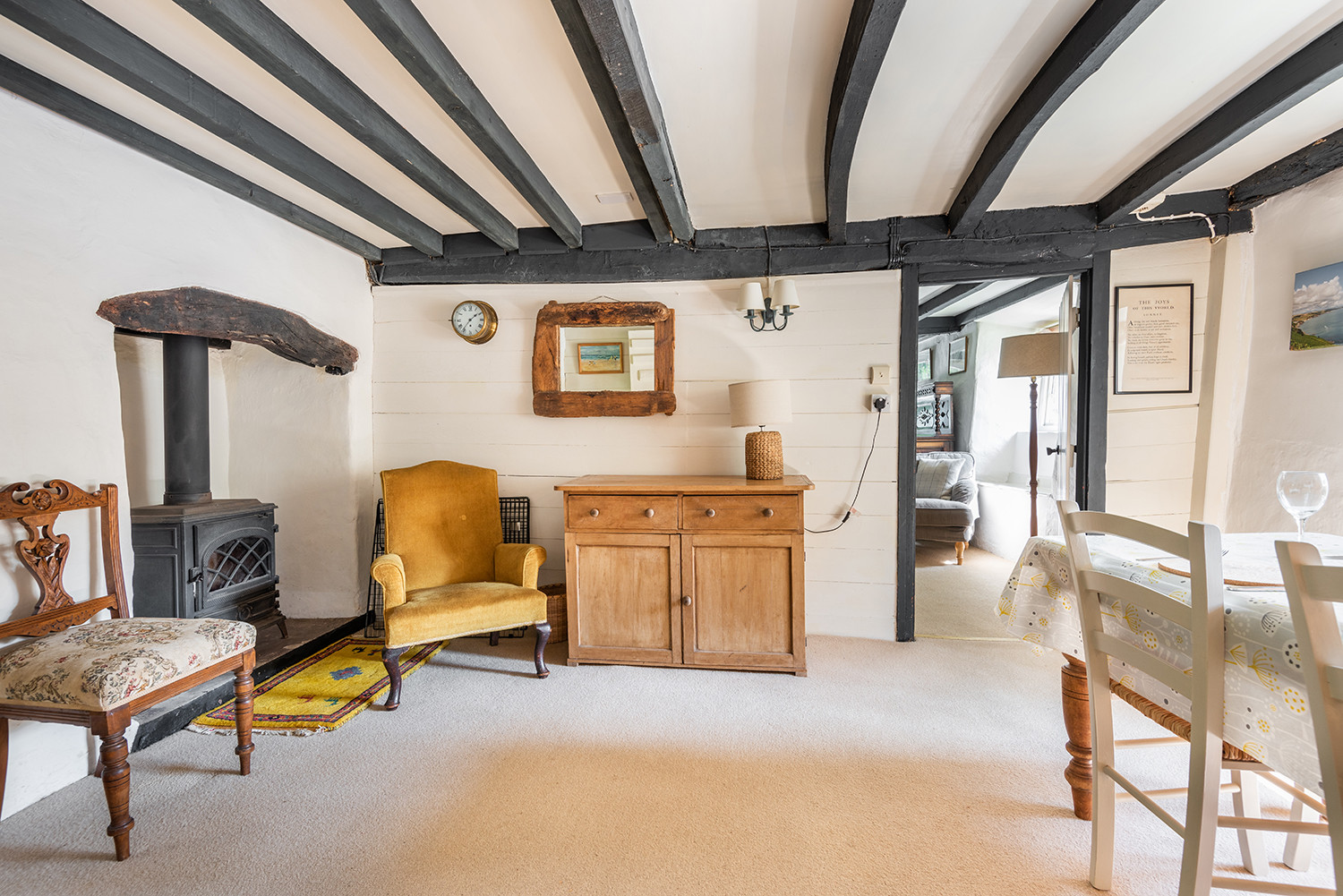 Spacious dining area with log burner
