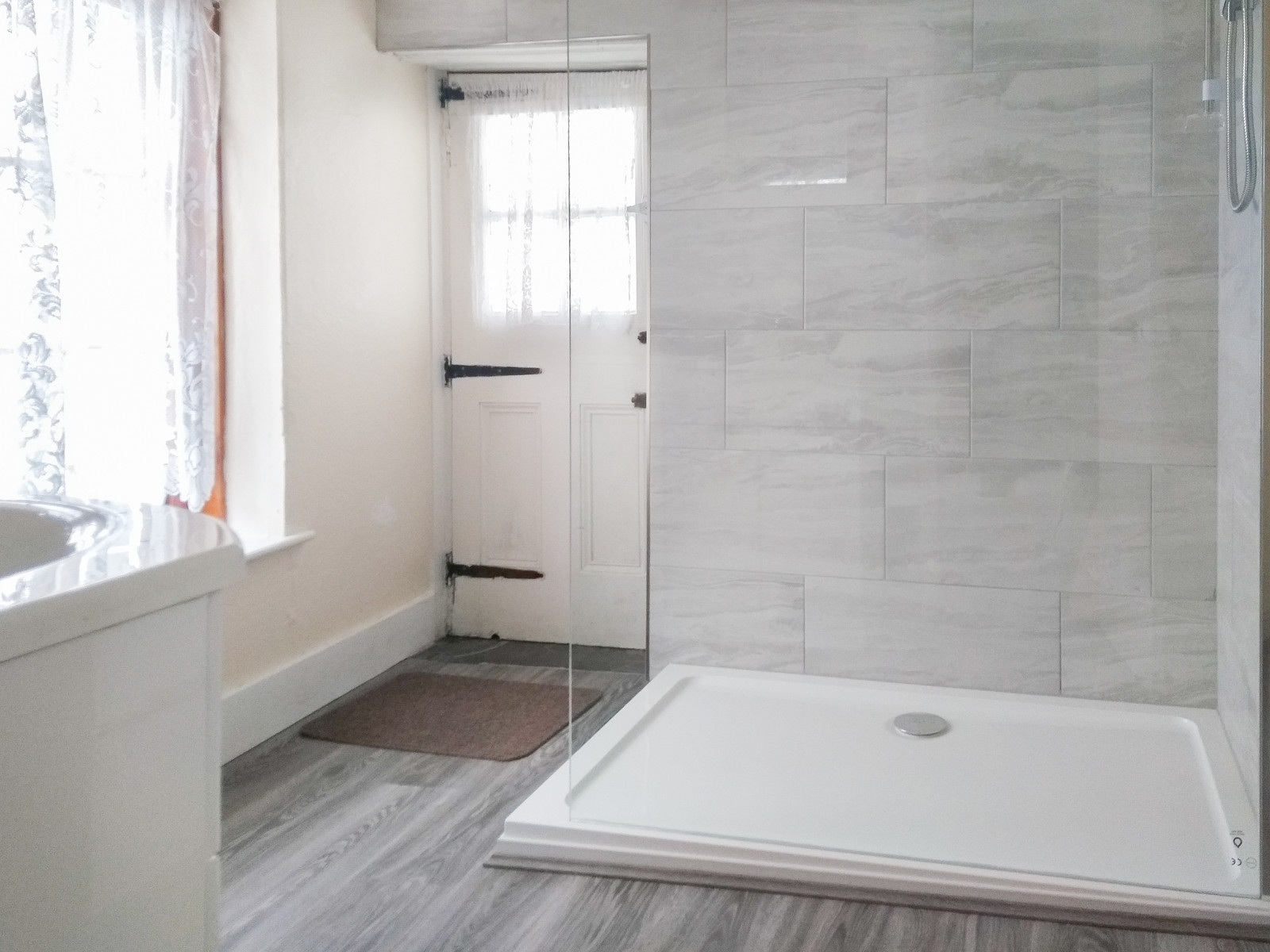 The new large walk in shower room