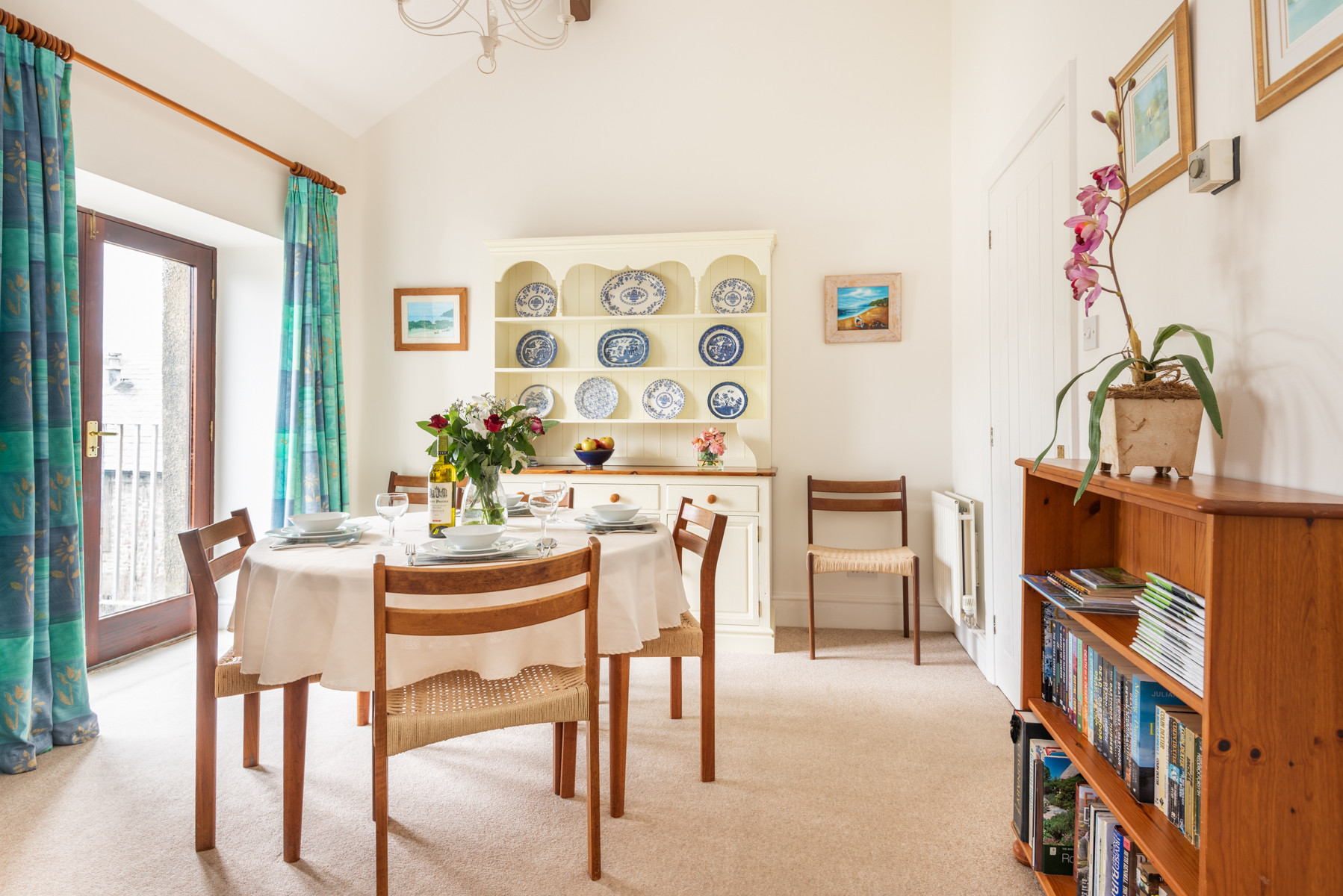 Dining area with table and chairs for 4