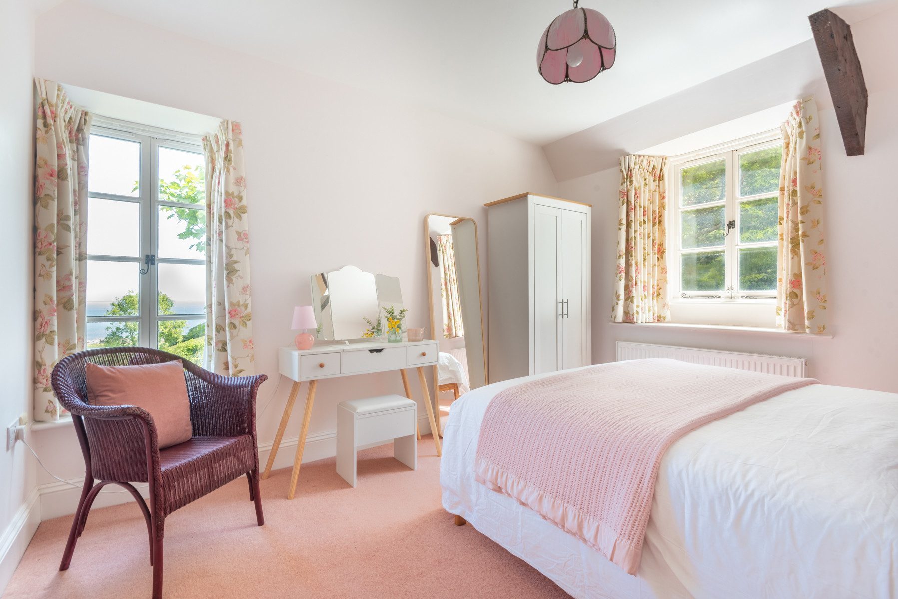 Pretty bedrooms with comfortable homely touches throughout