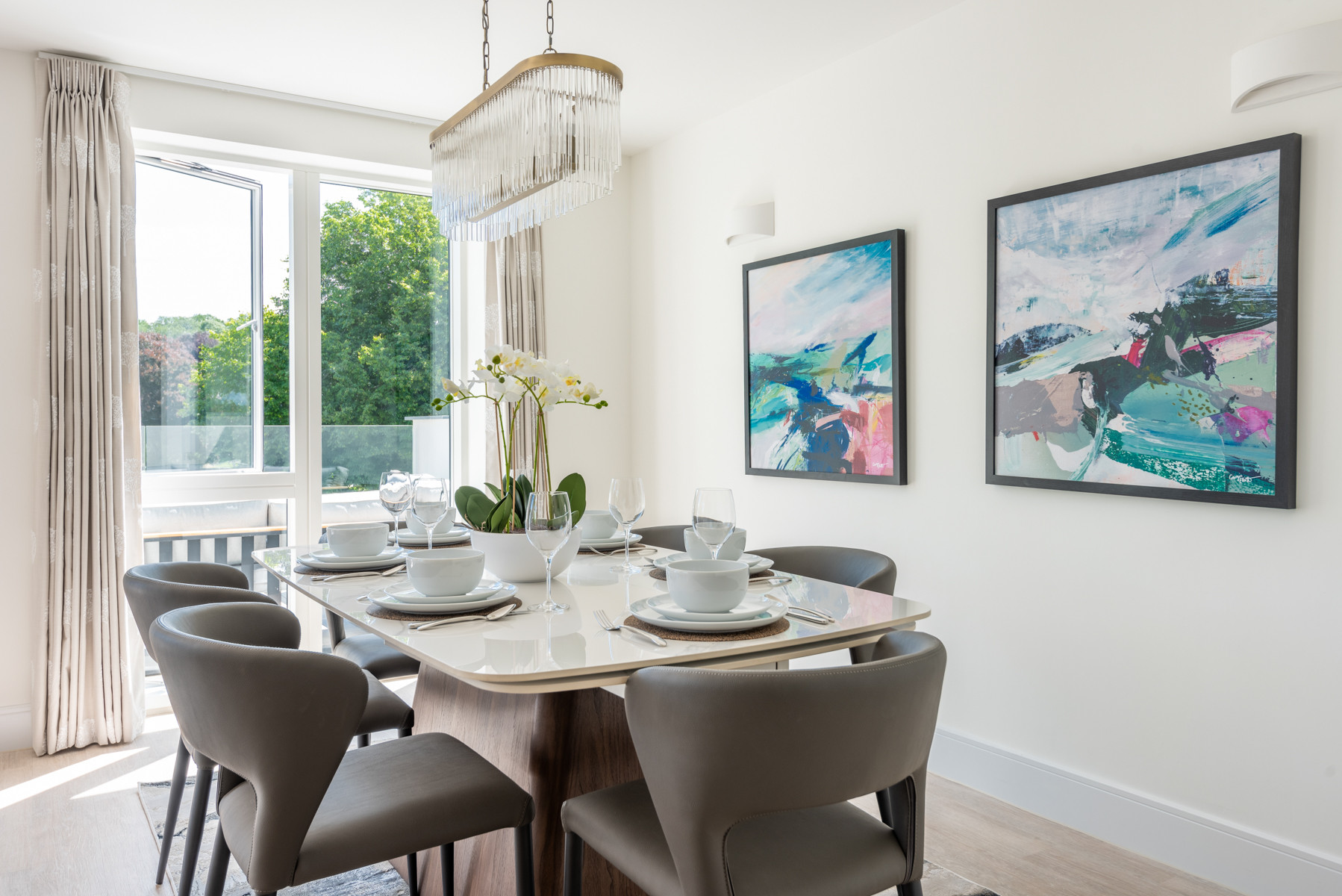 Stylish dining space with doors leading to the terrace