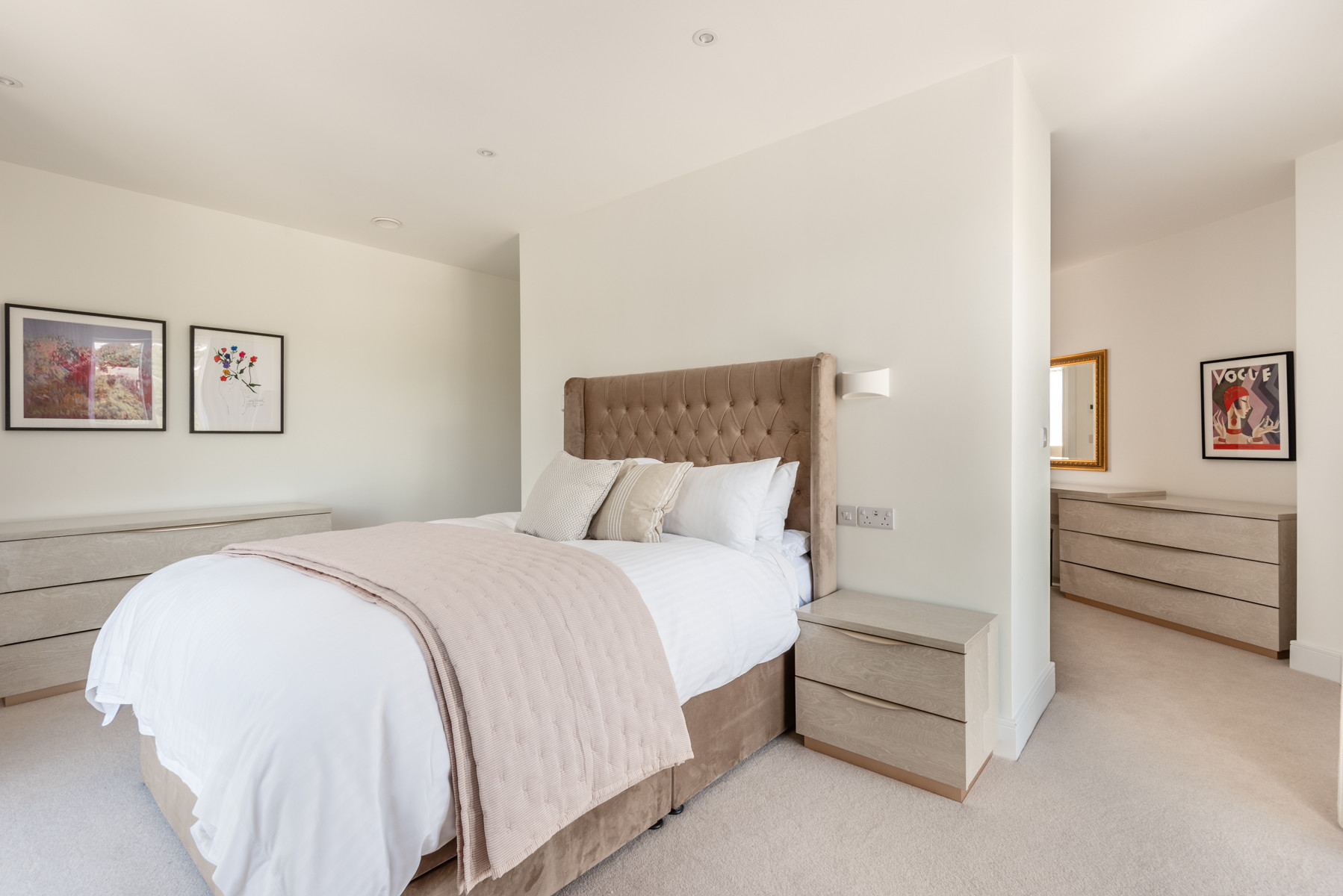 Bedroom 1-beautiful master suite with floating wall to create a dressing area