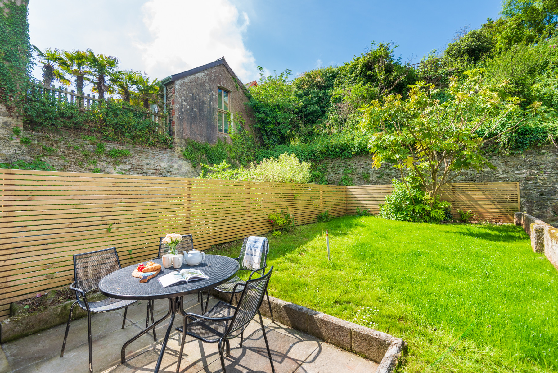 Lovely lawned garden with terrace