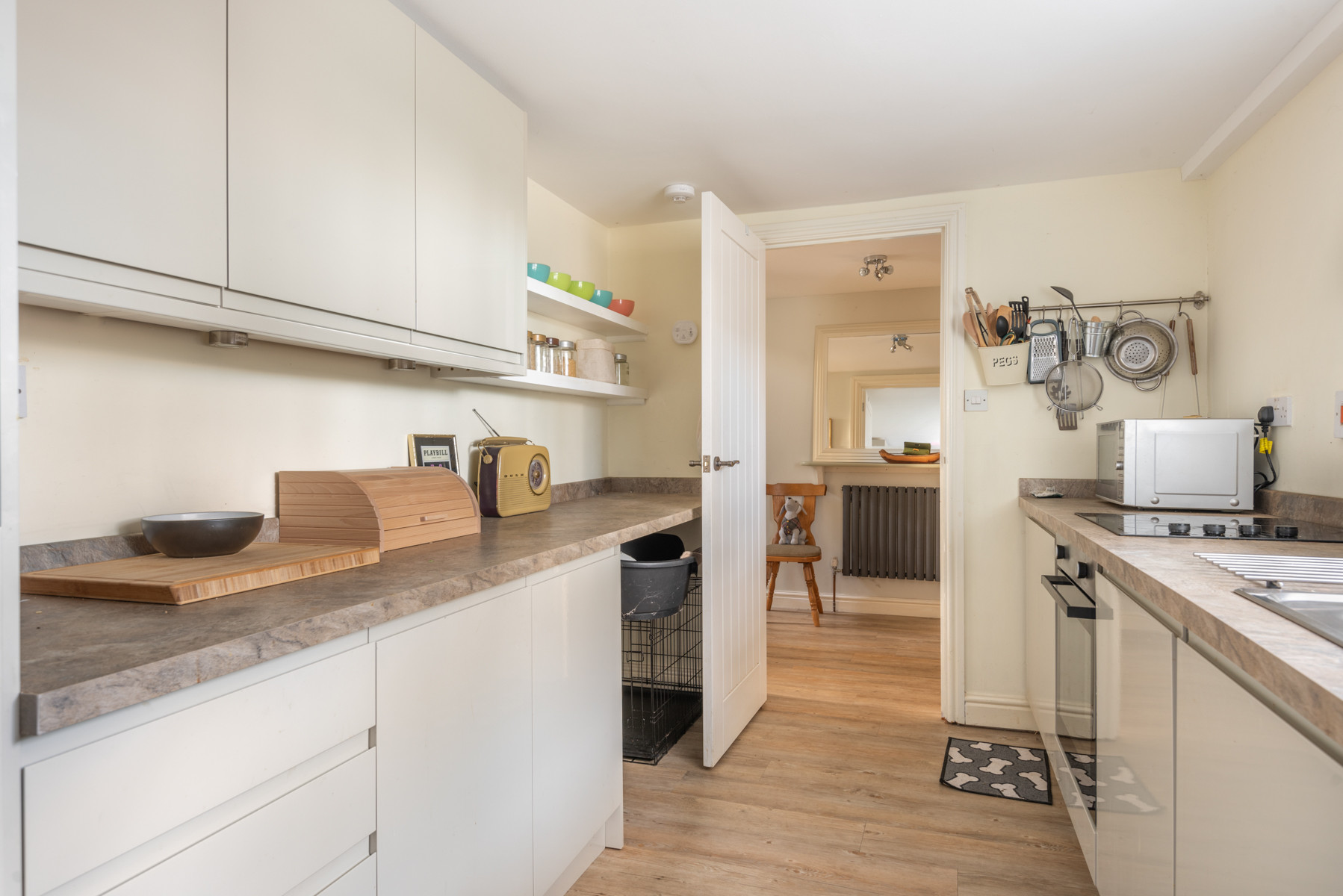 Shot from kitchen out to hallway.