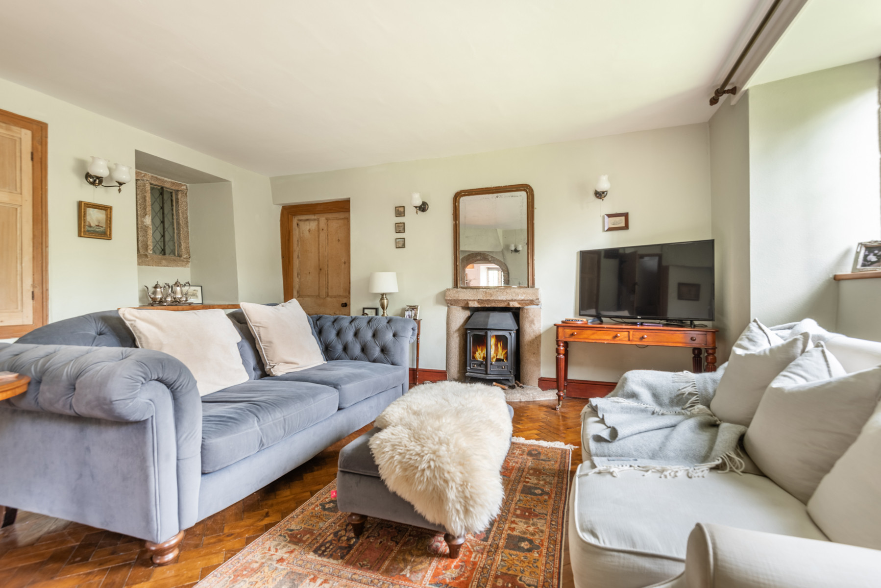 Drawing room with wood burner & smart TV