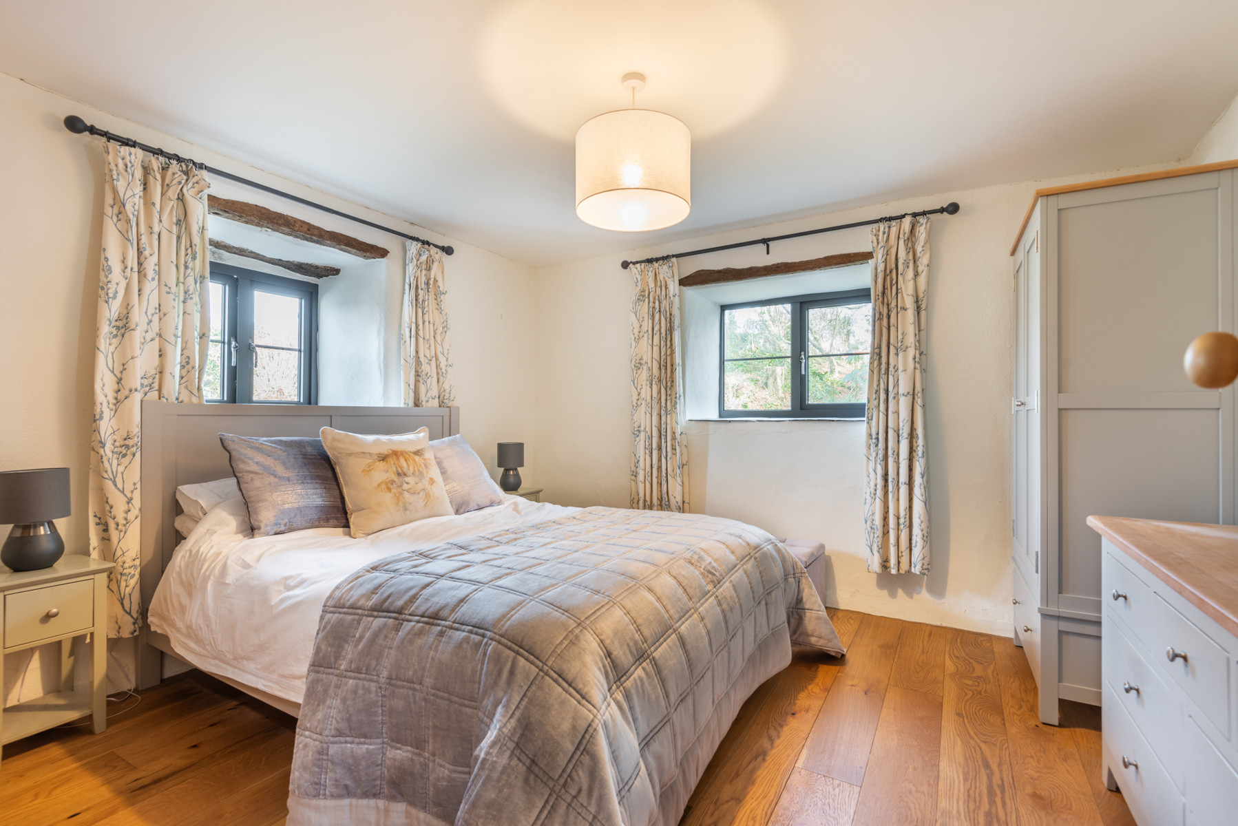 Ligh bedroom with king bed