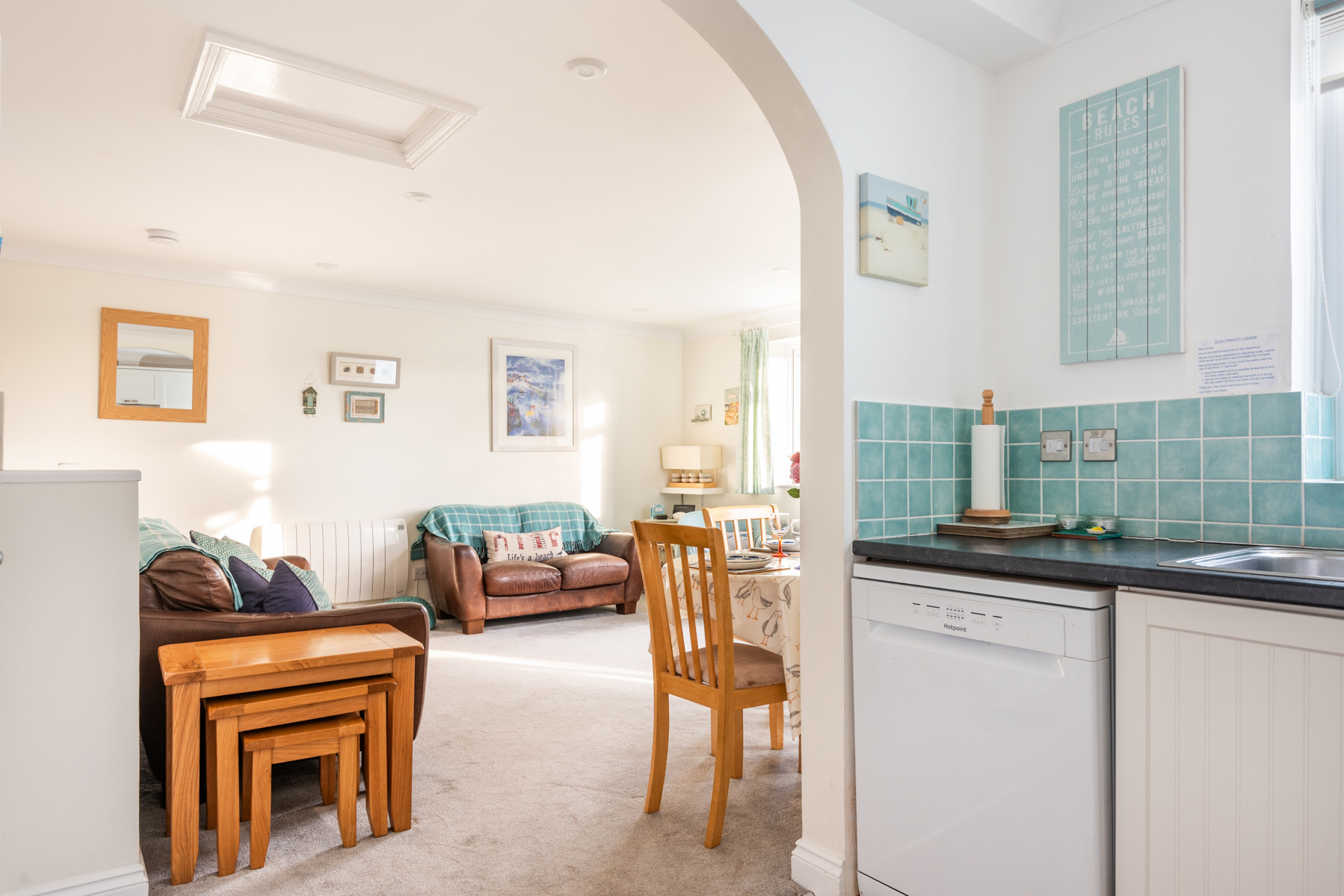 Looking through the arch from the kitchen to the lounge