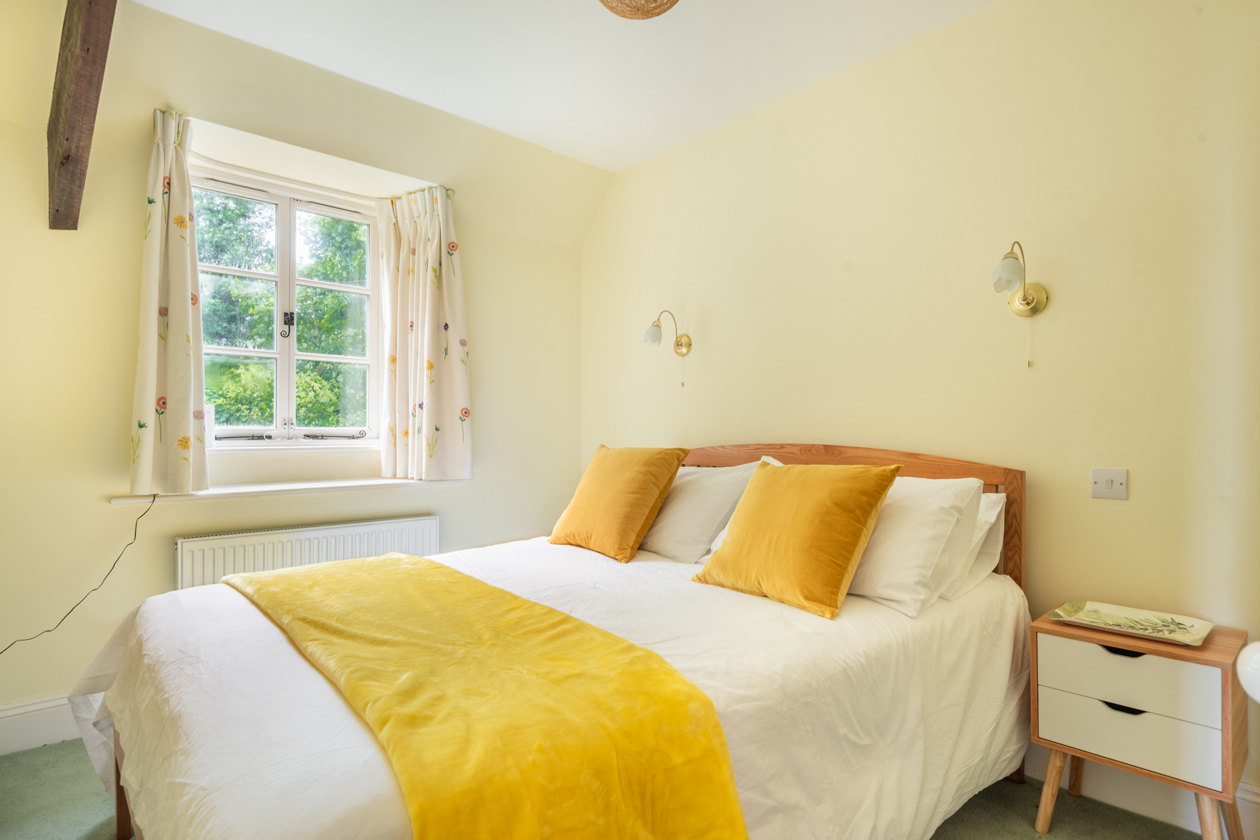 Bedroom 2, with views over the front garden
