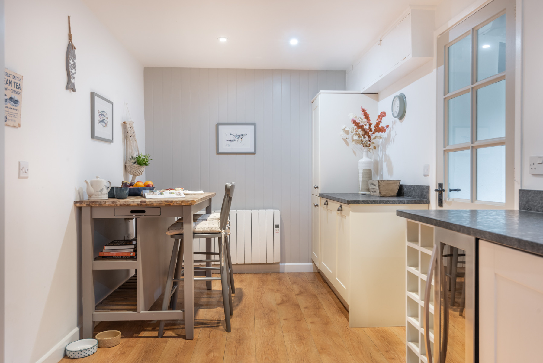 The door to the rear and breakfast bar 