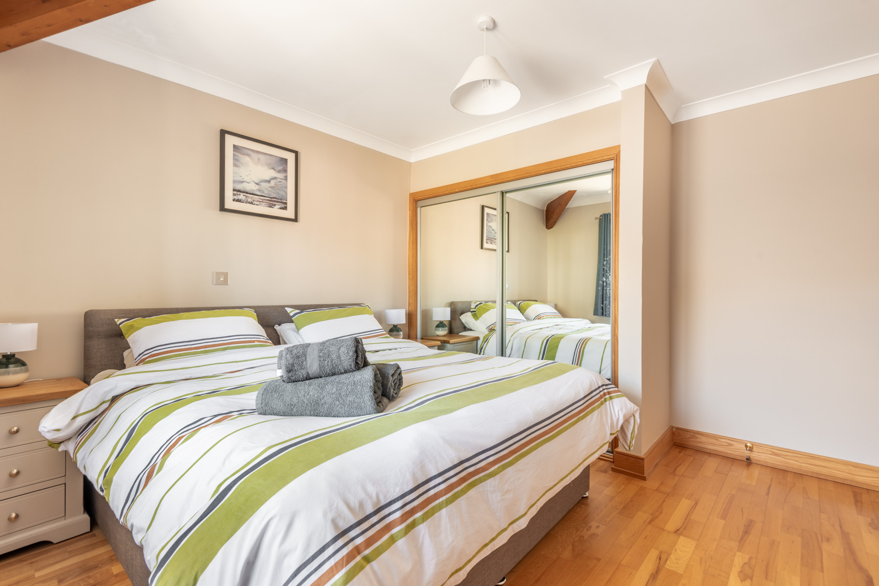 The second bedroom with built in wardrobes for plentiful storage.