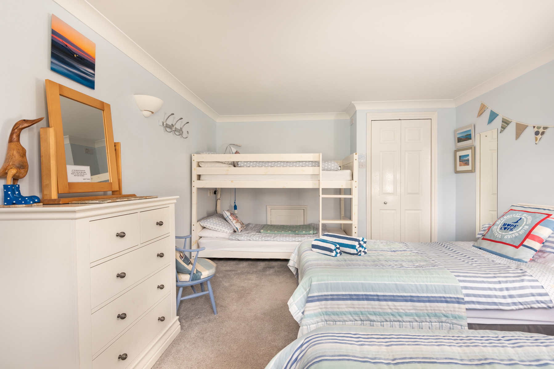 Second room with twins and bunk beds
