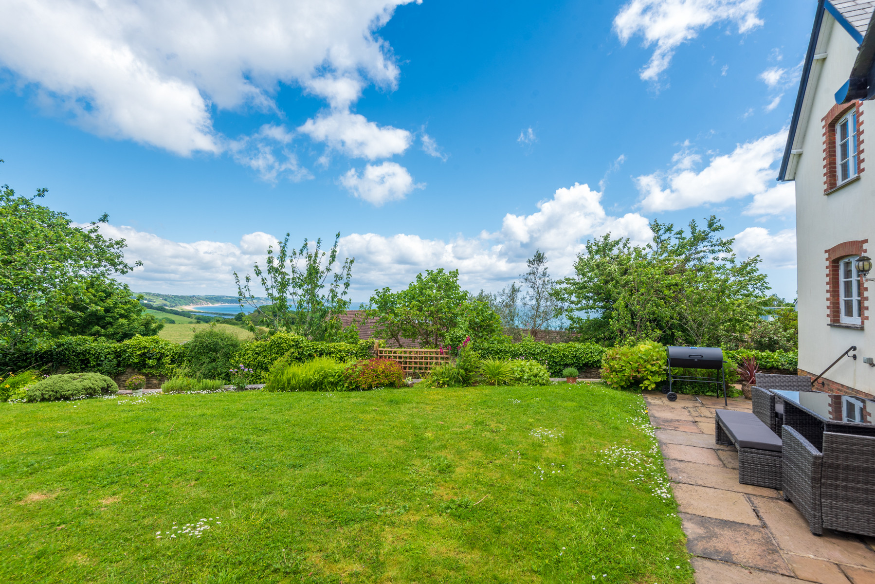 Another view of the garden and terrace looking out to sea