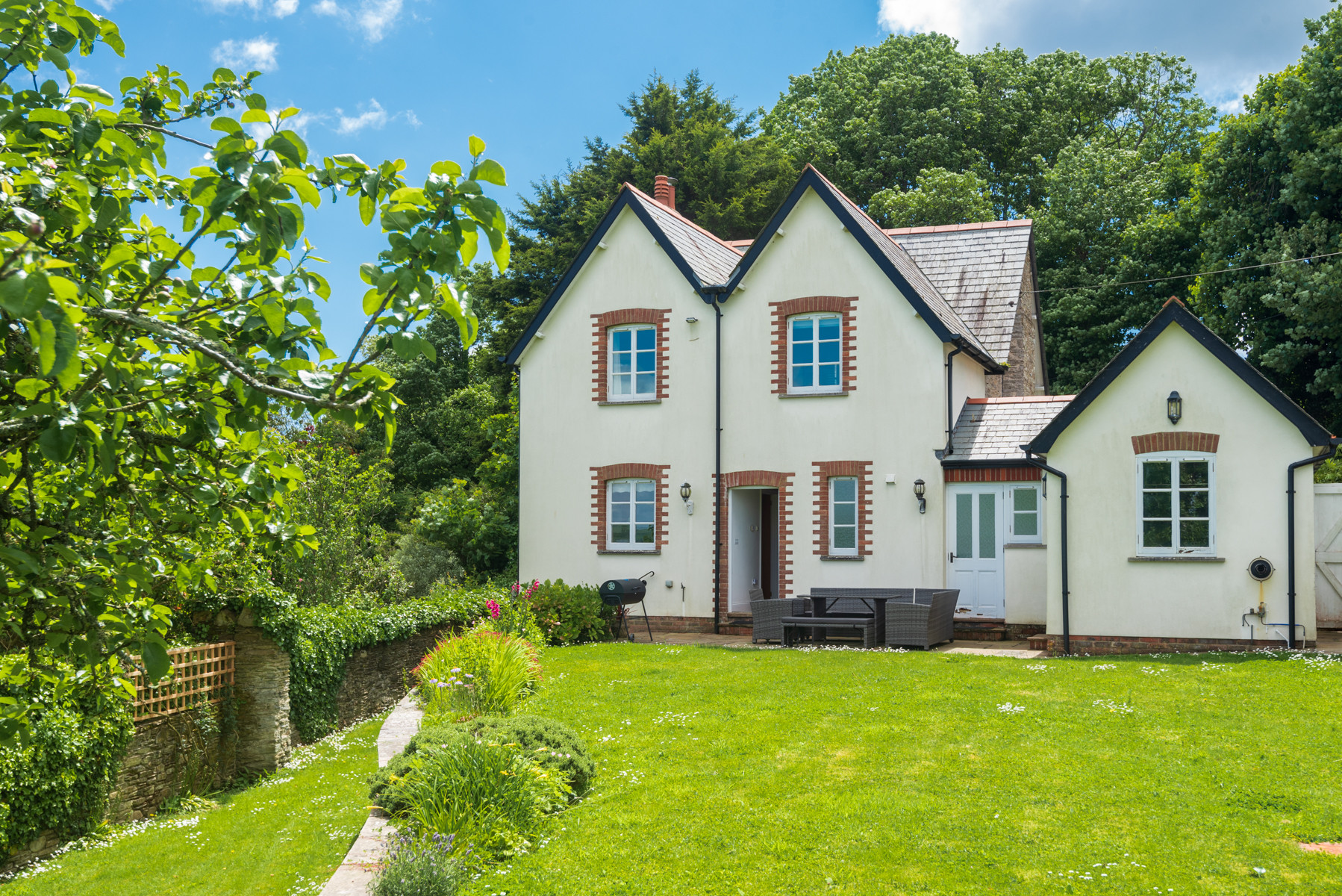 The rear garden looking back to Widewell Cottage