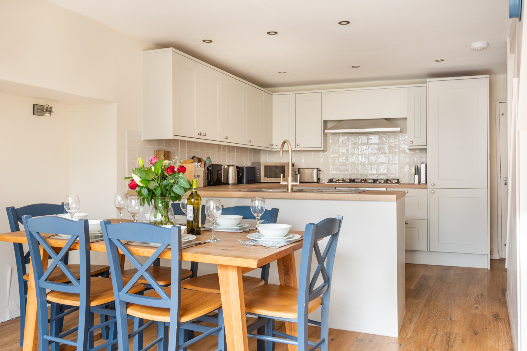 Another view of the dinning space and kitchen