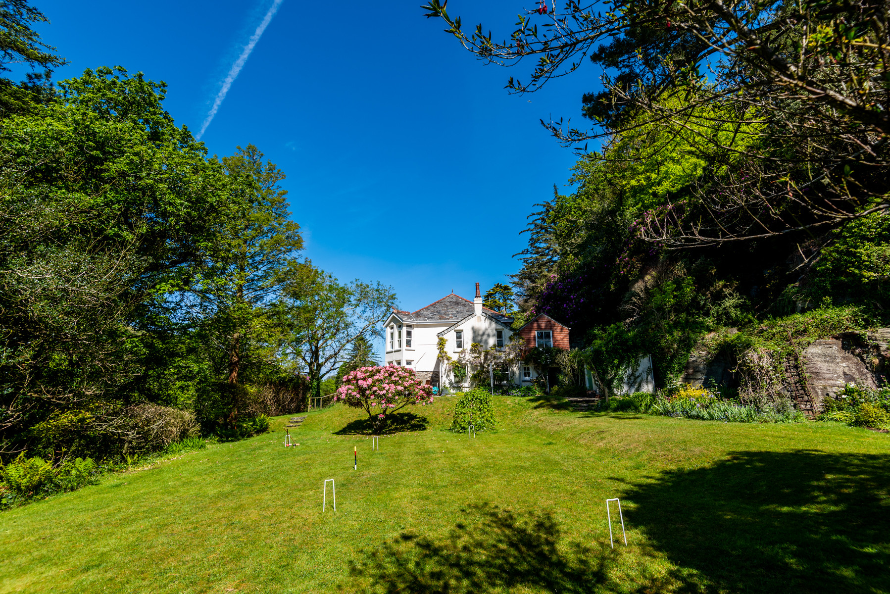 Beautiful view of the gardens, croquet lawn and house