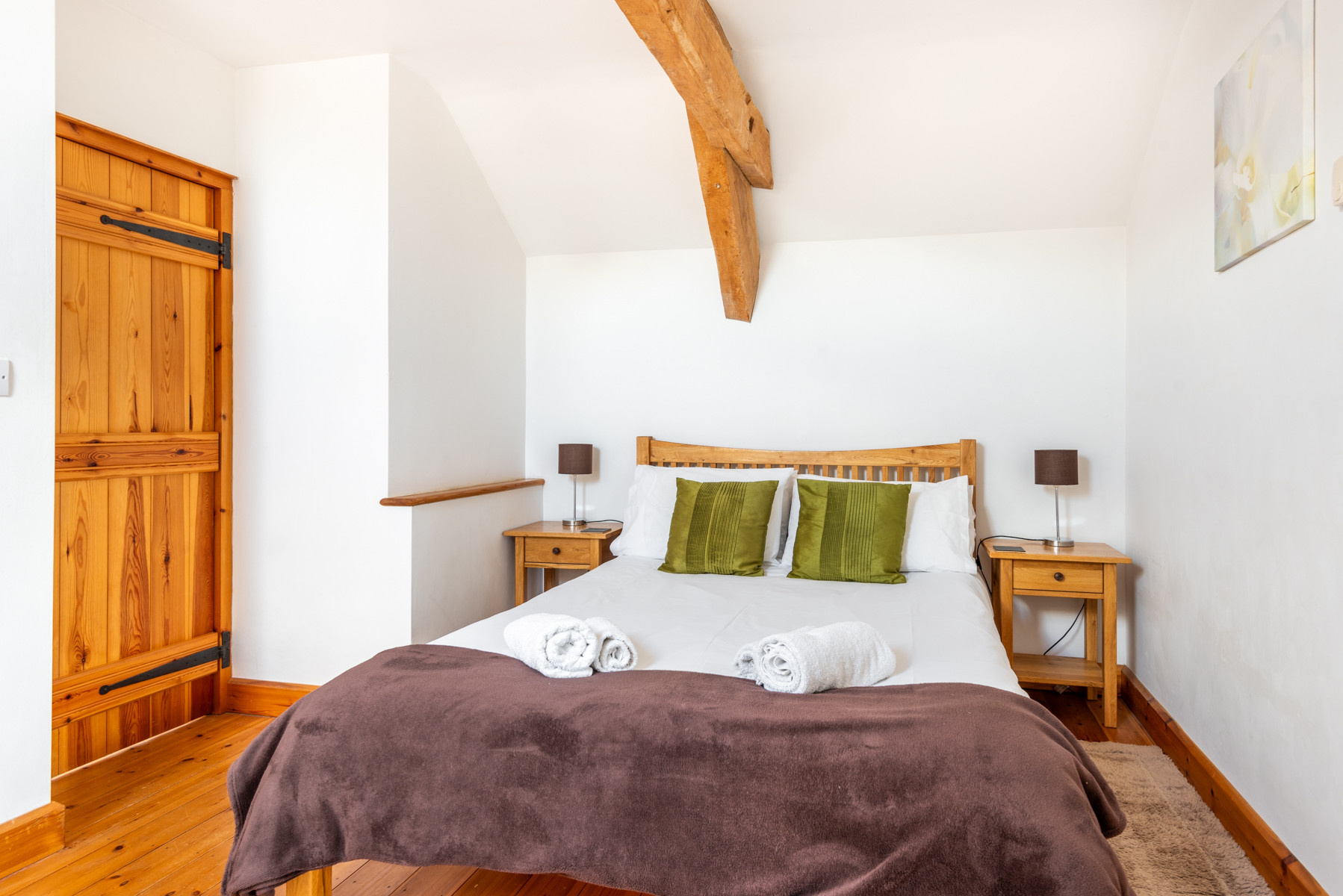 Bedroom 1 with a double and single bed.