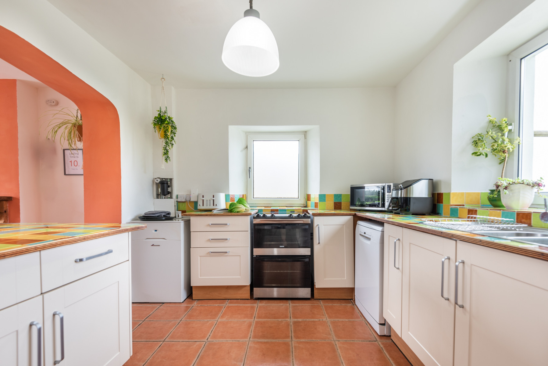 The well equipped and spacious kitchen.