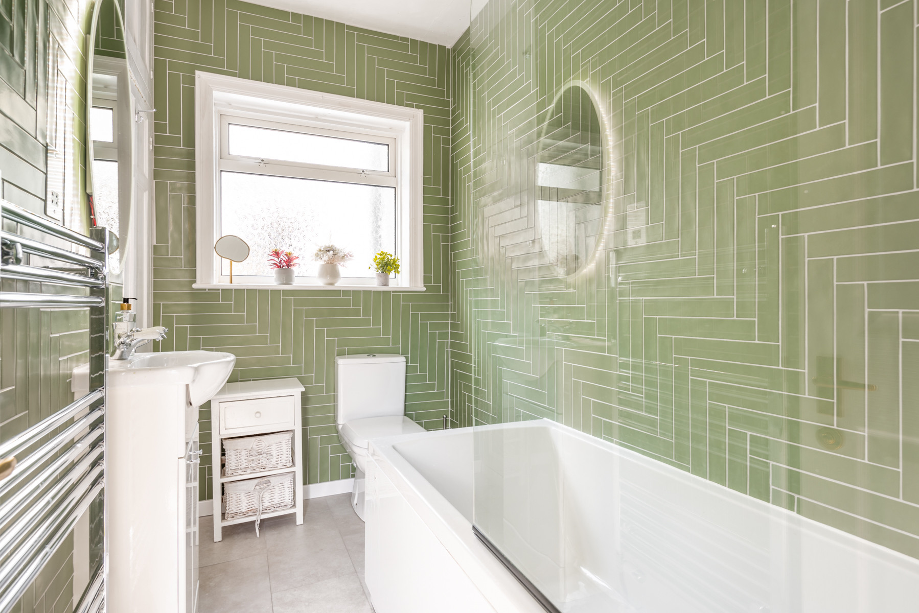 Family bathroom with shower over bath
