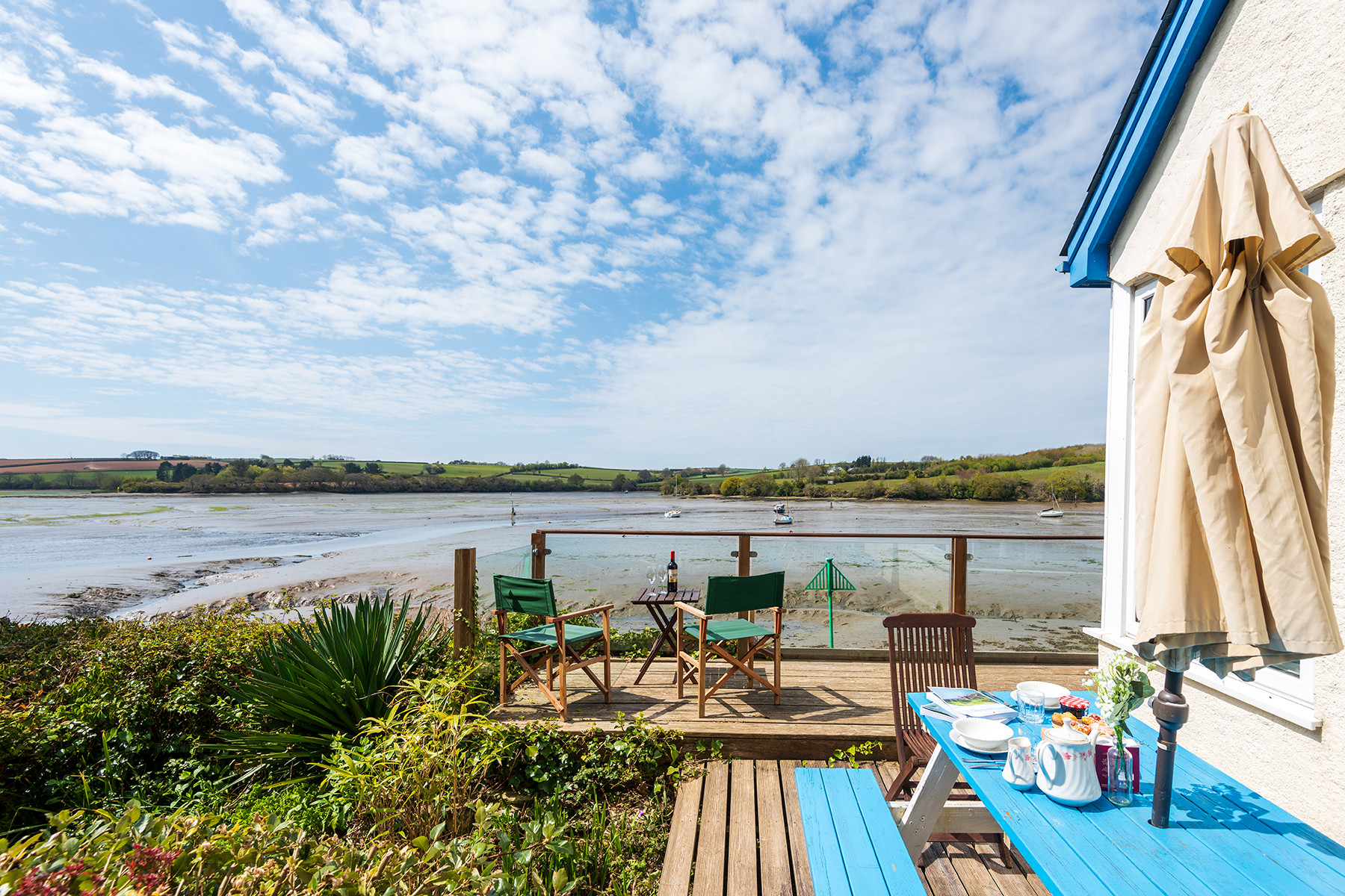 Another view of the deck and patio area to the side of the house.