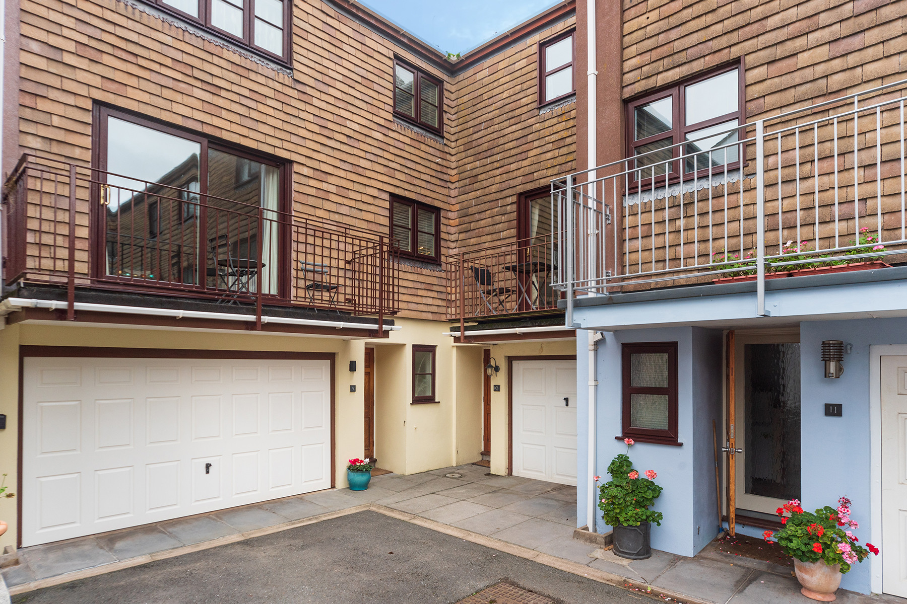 The entrance and garage for No.9 (left)