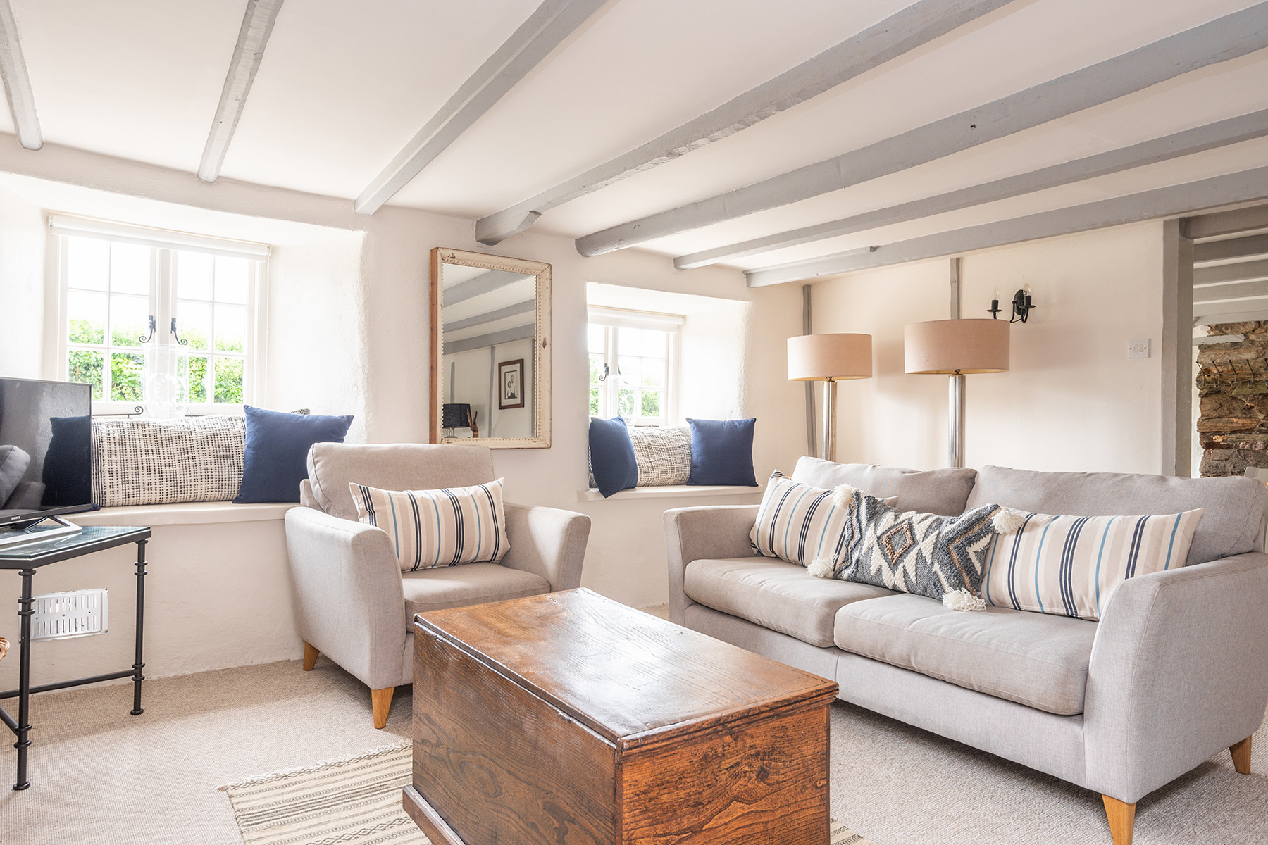 The lounge, with comfy sofas and pretty window seats.