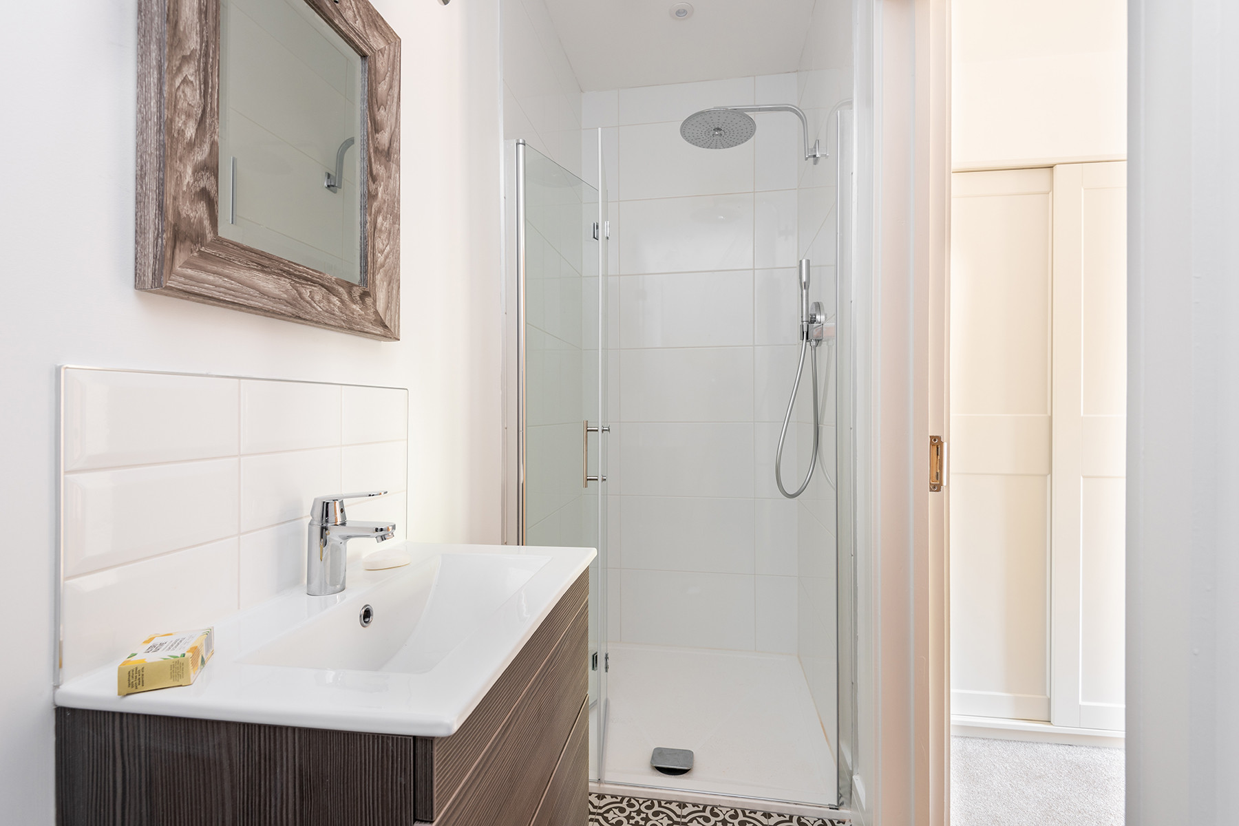 The ensuite shower room to bedroom two.