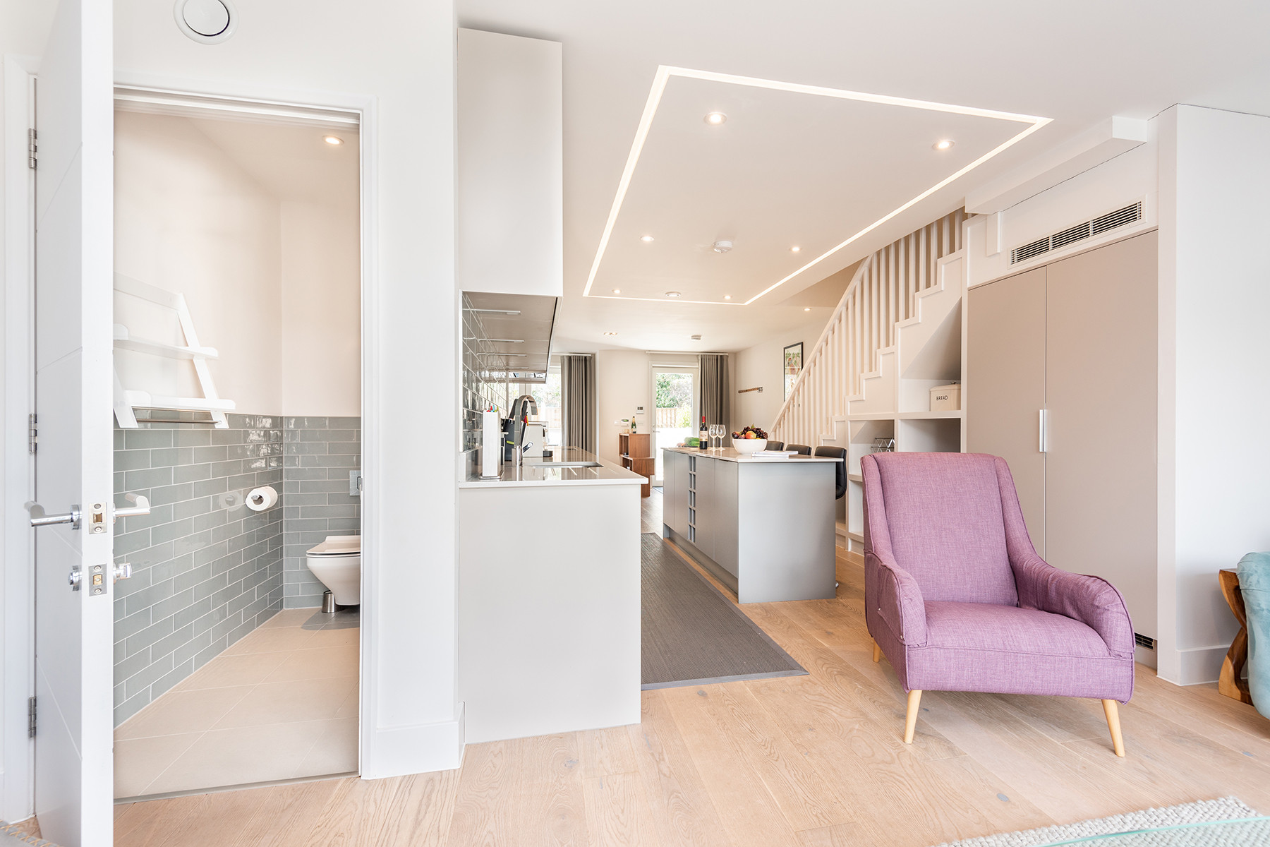 The lounge, kitchen and WC.